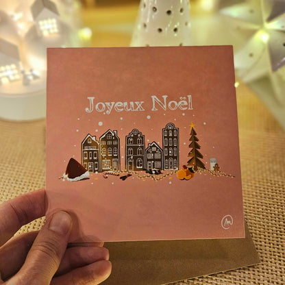 Carte de Noël représentant des maisons en pain d’épices